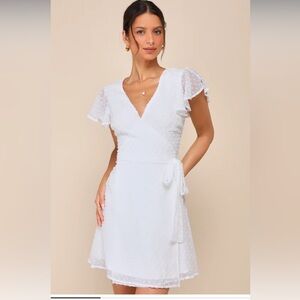 Brand New with tags. White Swiss Dot Flutter Sleeve Wrap Mini Dress. Small.